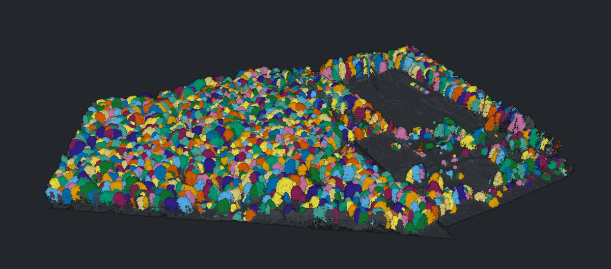3D view of the Benton Hollow tract with every tree segmented and drawn in its own color, with a cleared area and a lattice tower at the upper right.